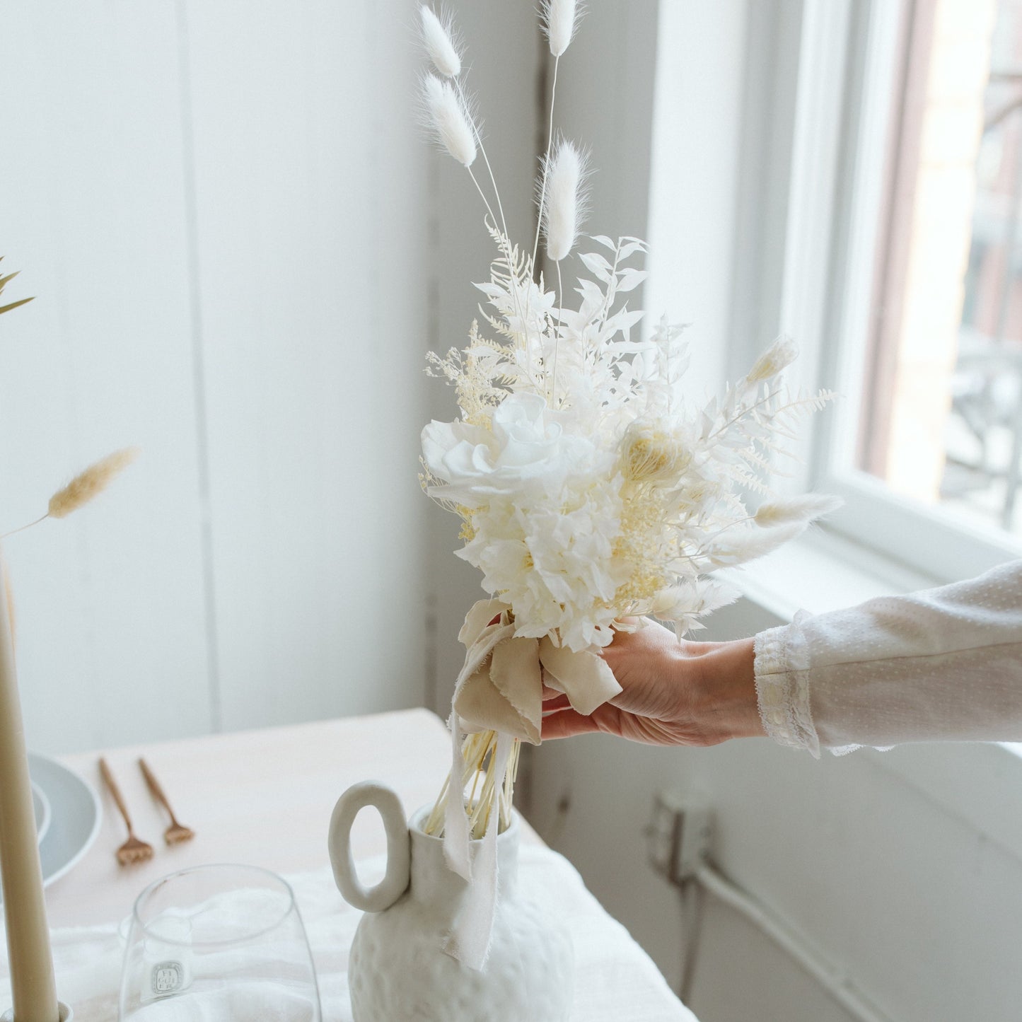  Photo is an example of a bridesmaid bouquet with ivory accent color.