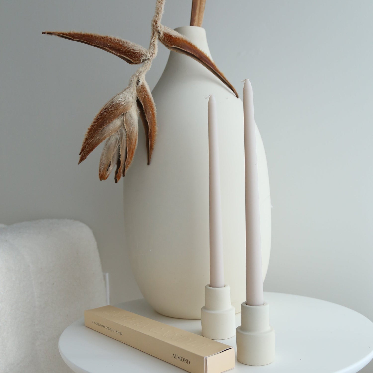 Soy taper candles set in almond available at Rook & Rose.