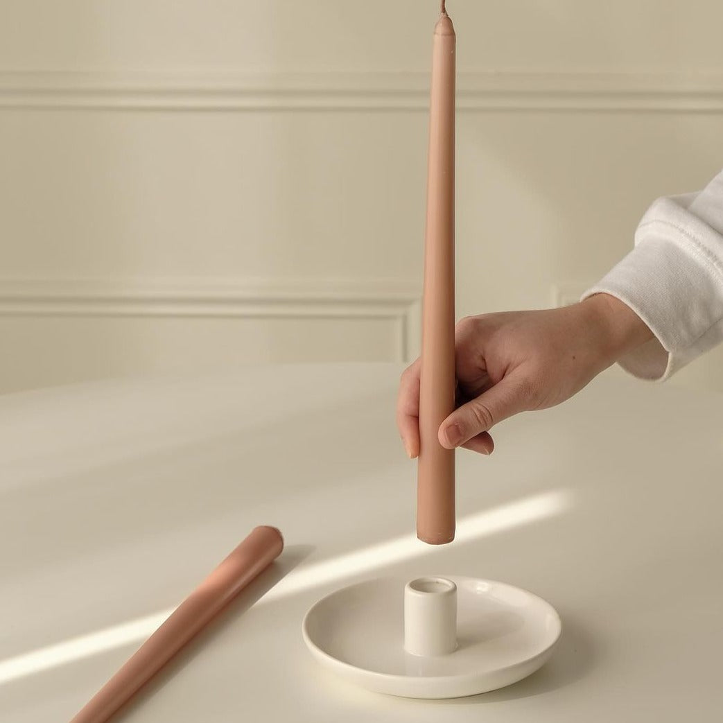 Ceramic taper candle holder in glossy white available at Rook & Rose.