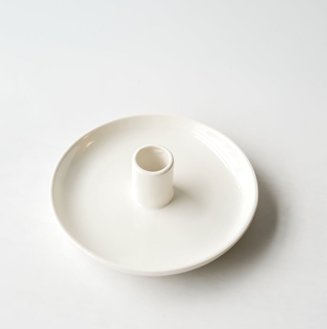 Ceramic taper candle holder in glossy white available at Rook & Rose.