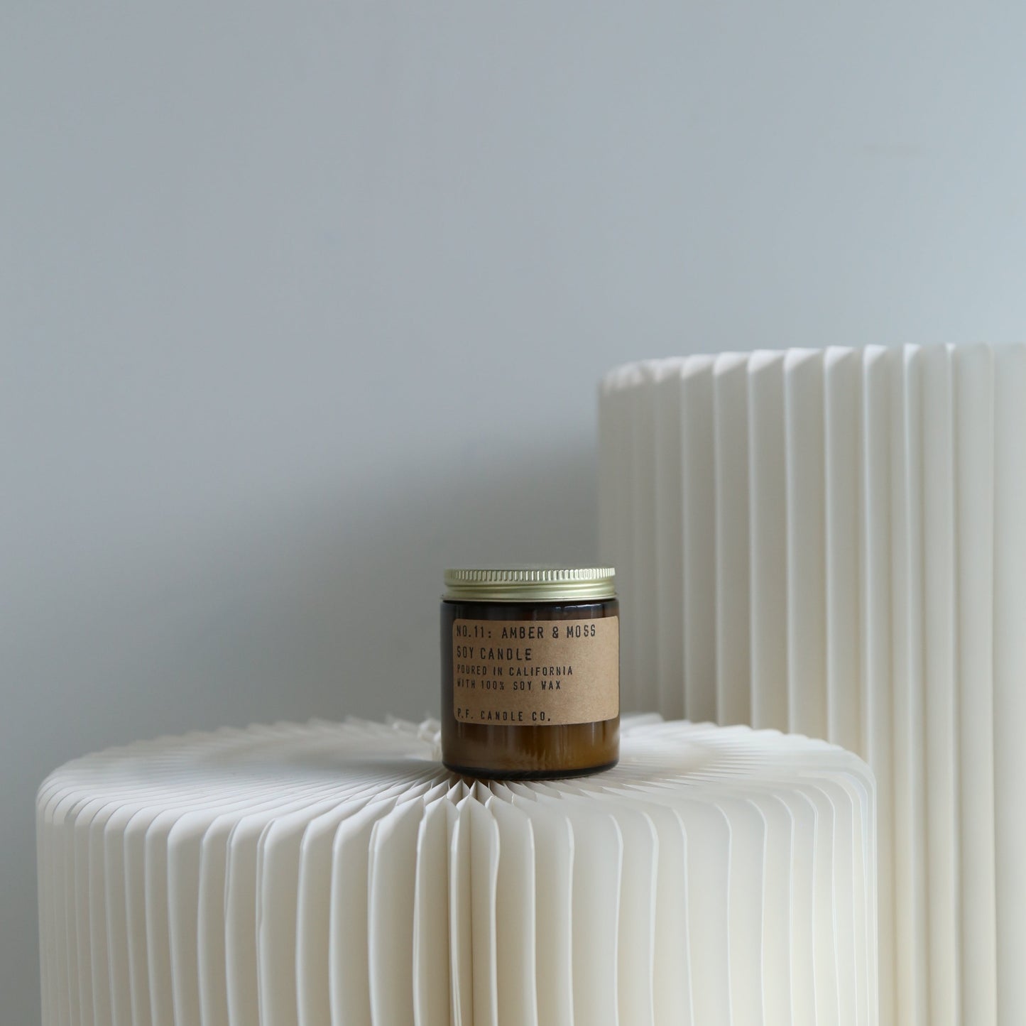 P.F. Candle Co mini amber and moss candle available at Rook & Rose.