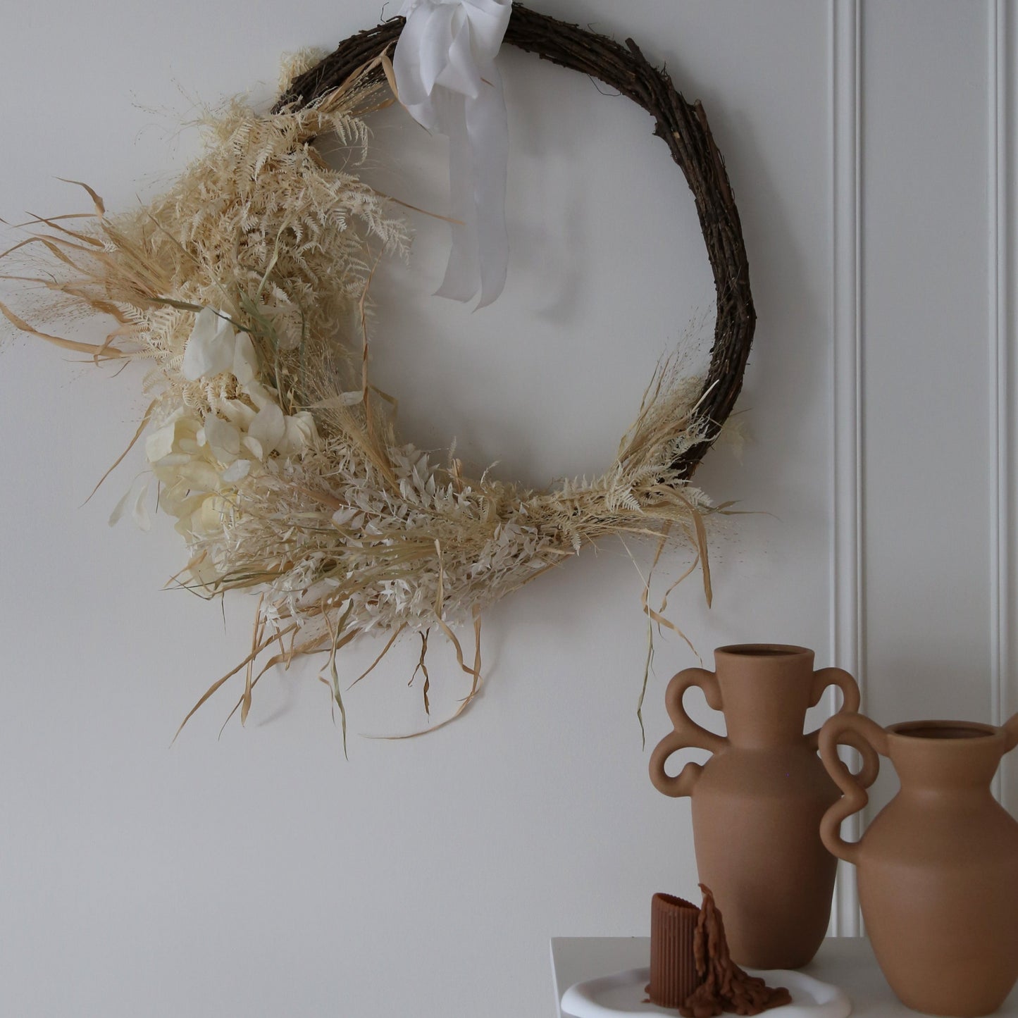 Photo is an example of a large crescent rustic wreath.