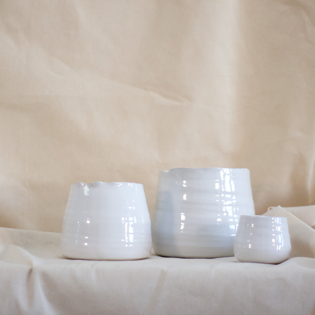 White 3" ceramic vase available at Rook & Rose