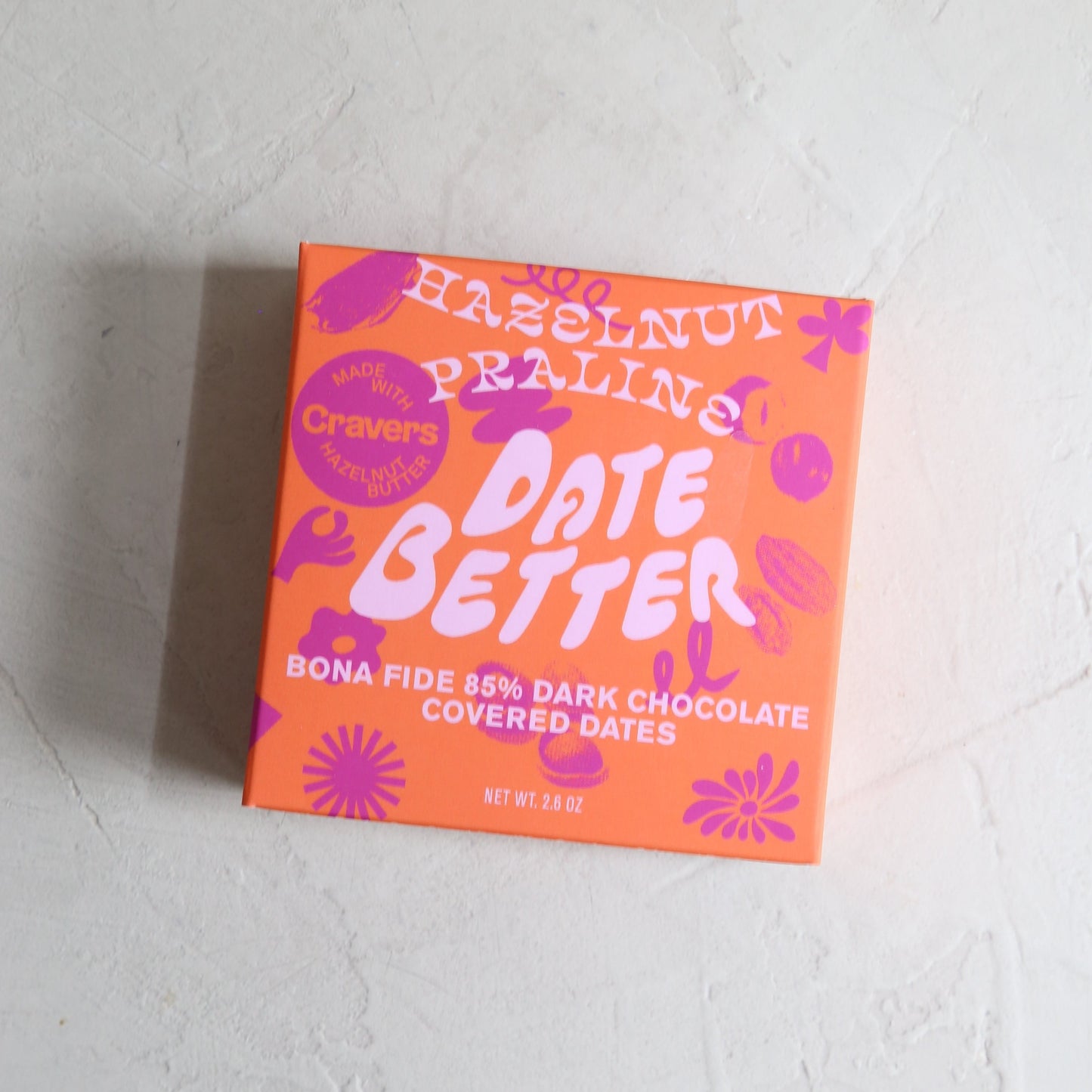 Date Better x Cravers hazlnut praline dark chocolate cover dates available at Rook & Rose.