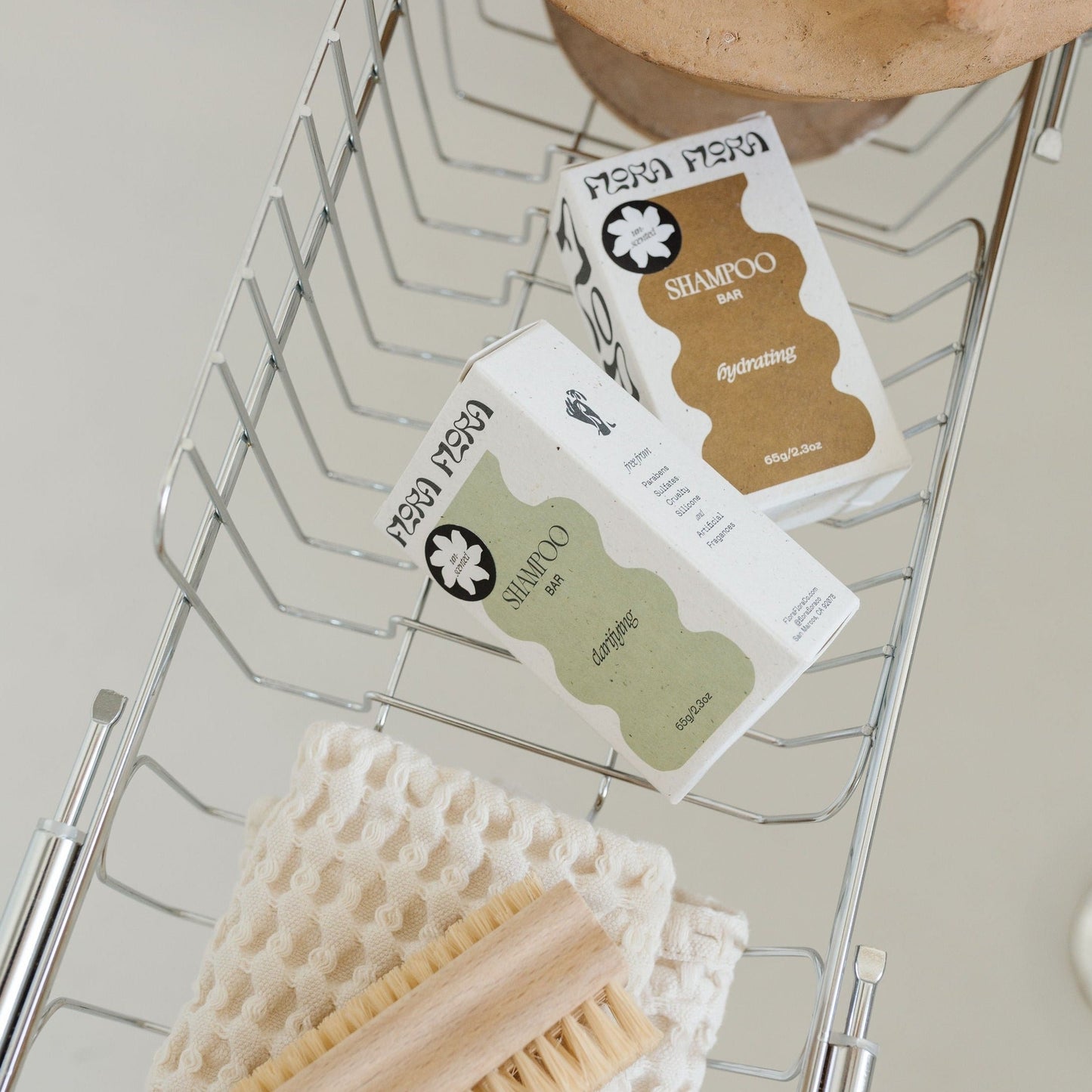 Flora Flora all natural hydrating and clarifying shampoo bar available at Rook & Rose.