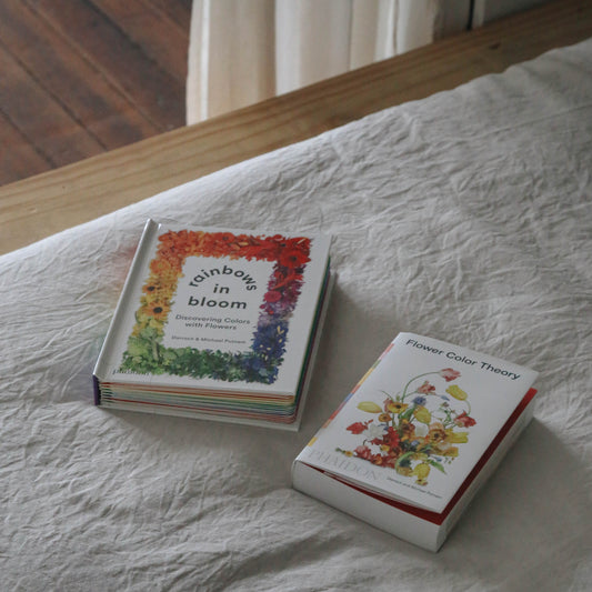 Rainbows in Bloom children's interactive hardcover book available at Rook & Rose. 