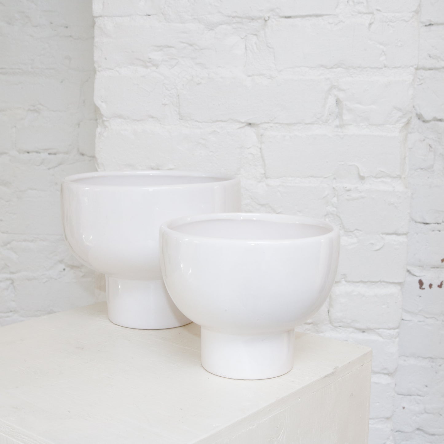 White 8" glazed ceramic vase available at Rook & Rose