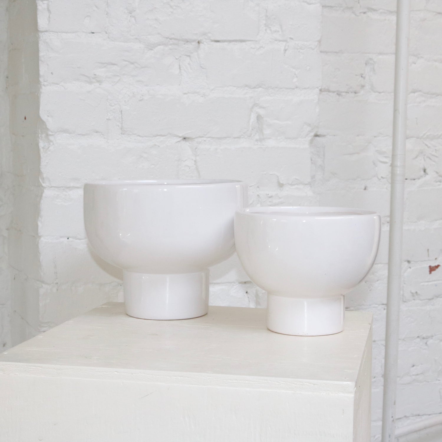 White 8" glazed ceramic vase available at Rook & Rose