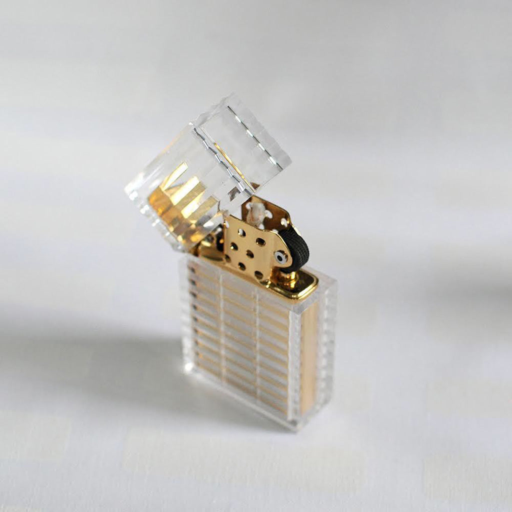 Gold Tsubota Pearl hard edge lighter available at Rook & Rose