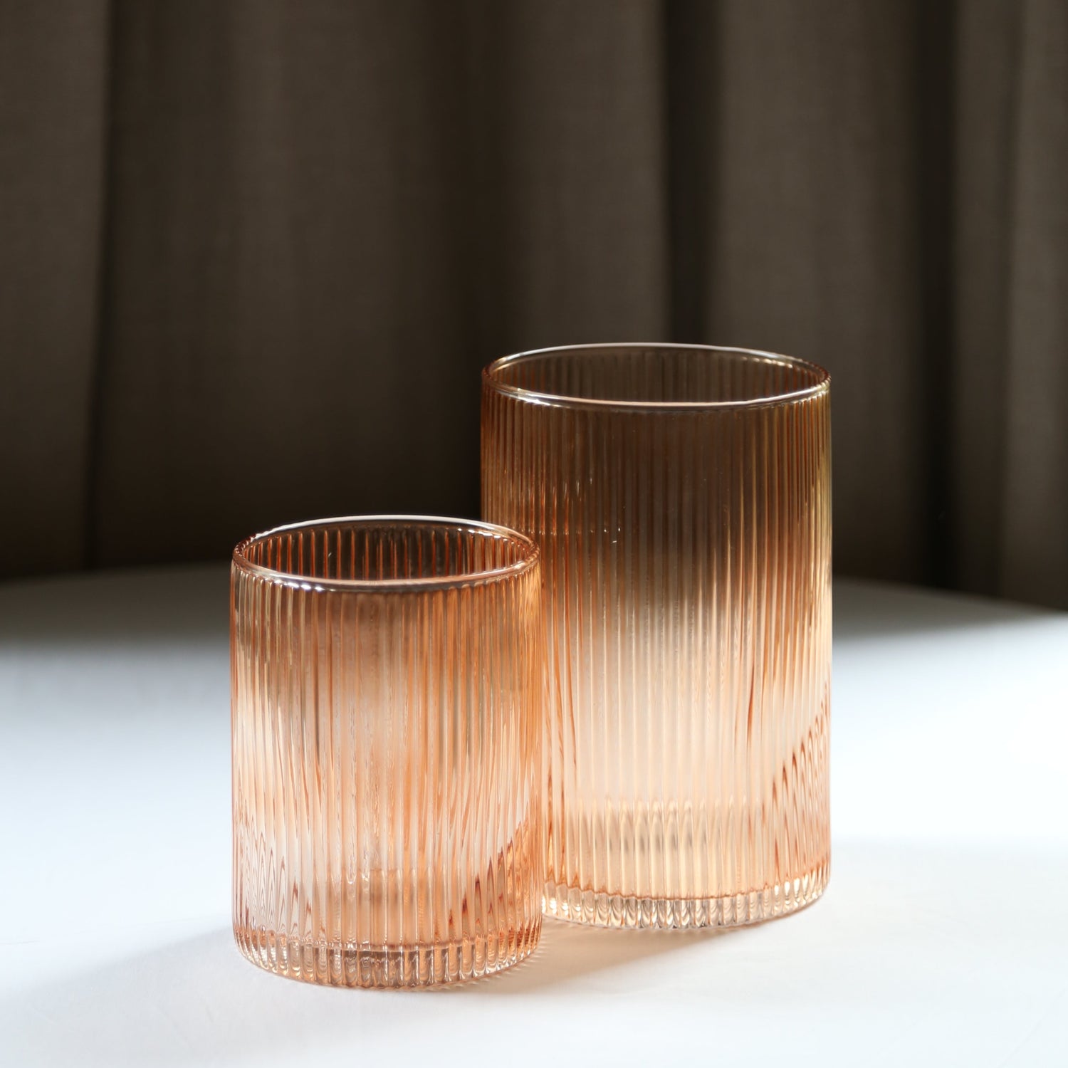 Bellini amber glass vases available at Rook & Rose.