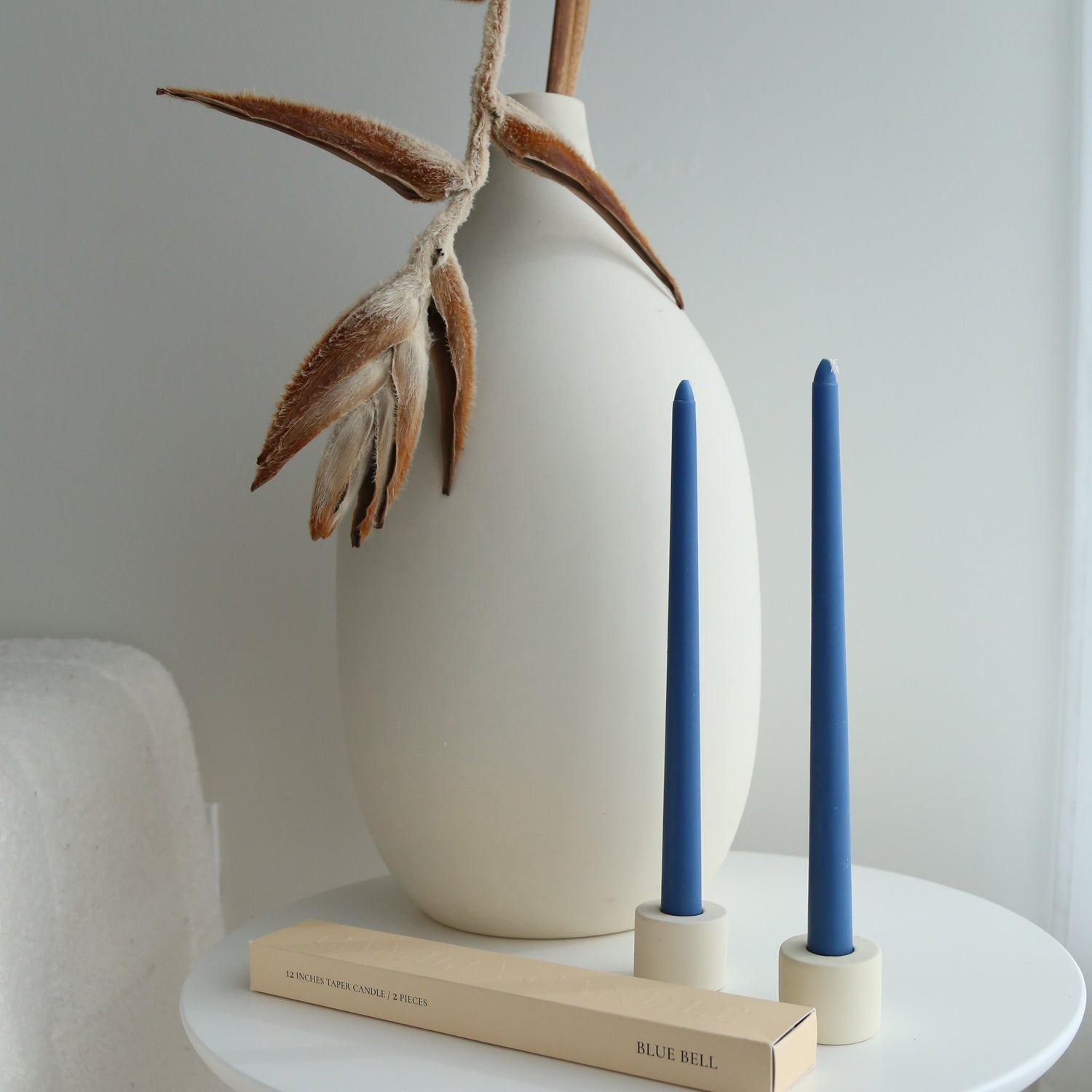 Soy taper candles set in blue bell available at Rook & Rose. 