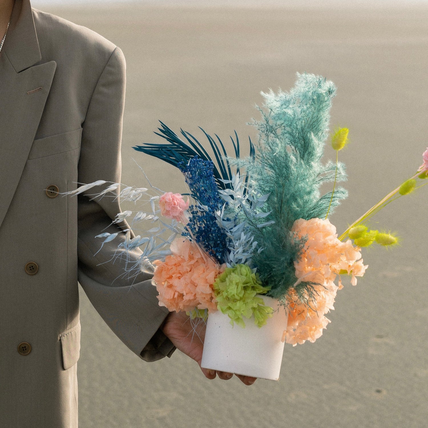 Photo is an example of a small bright dried arrangement.