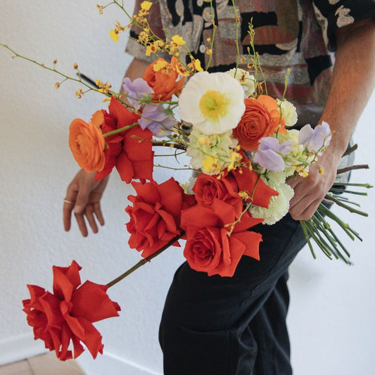 Photo is an example of a large bright fresh bouquet.