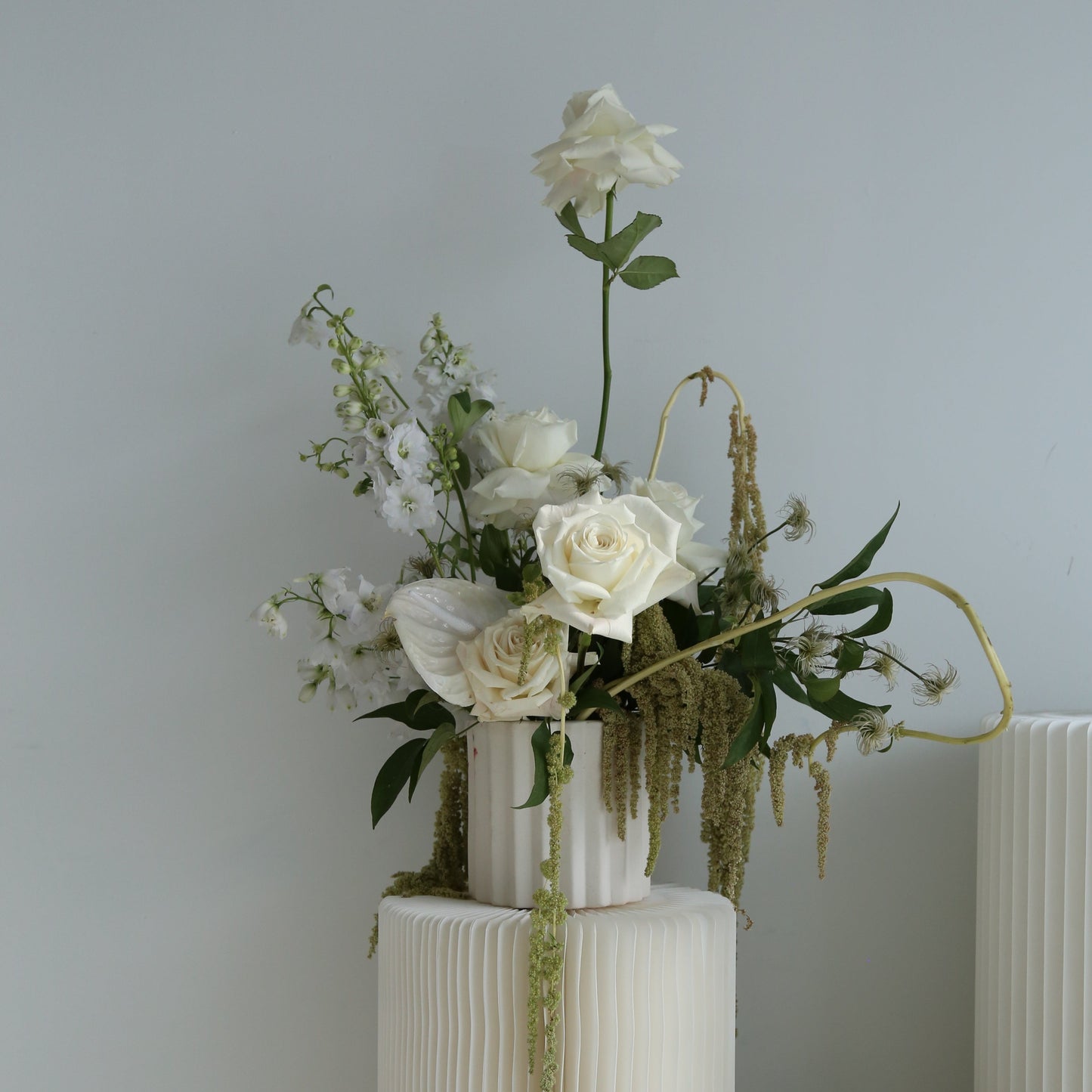 Photo is an example of a large neutral fresh arrangement.