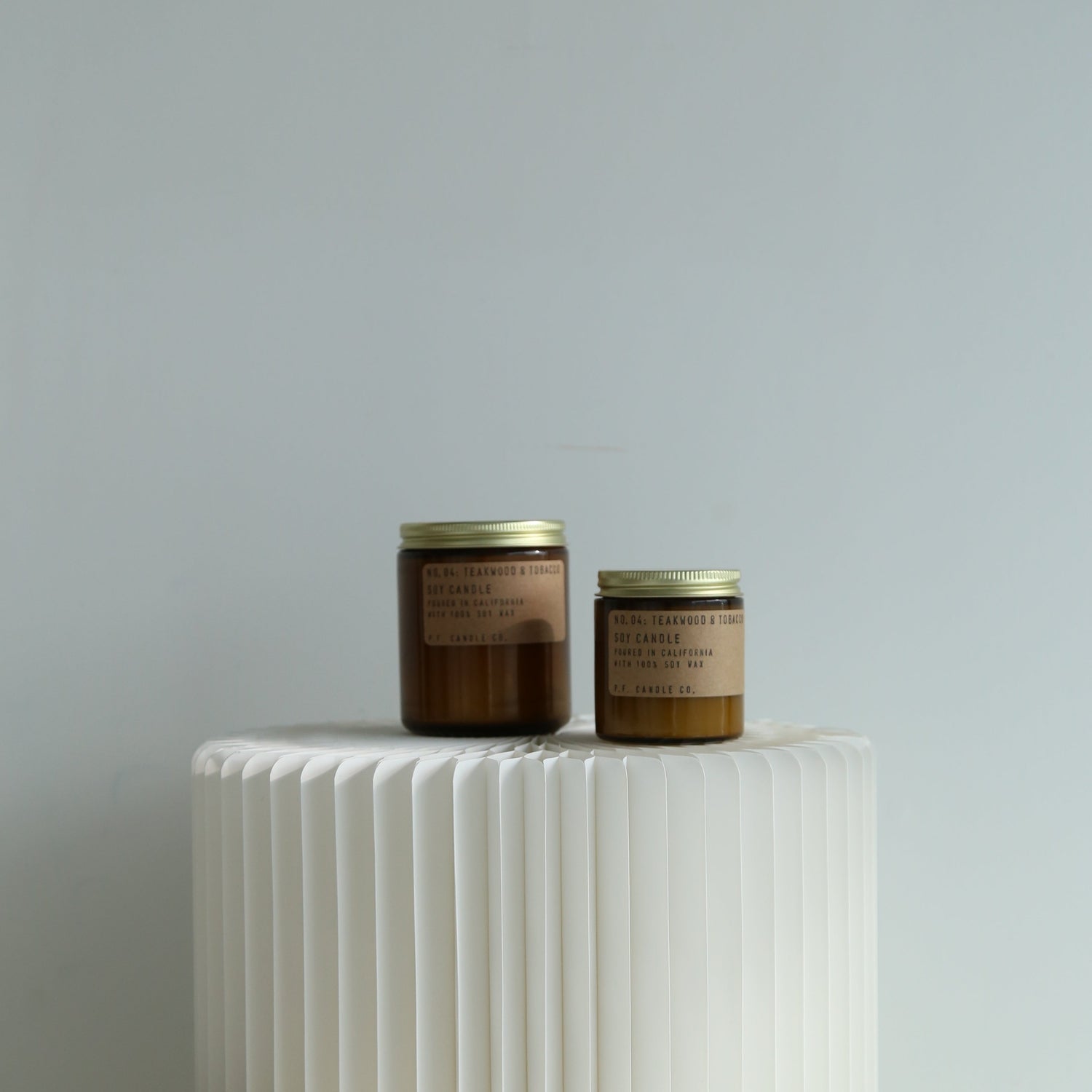 P.F. Candle Co mini teakwood and tobacco candle available at Rook & Rose.