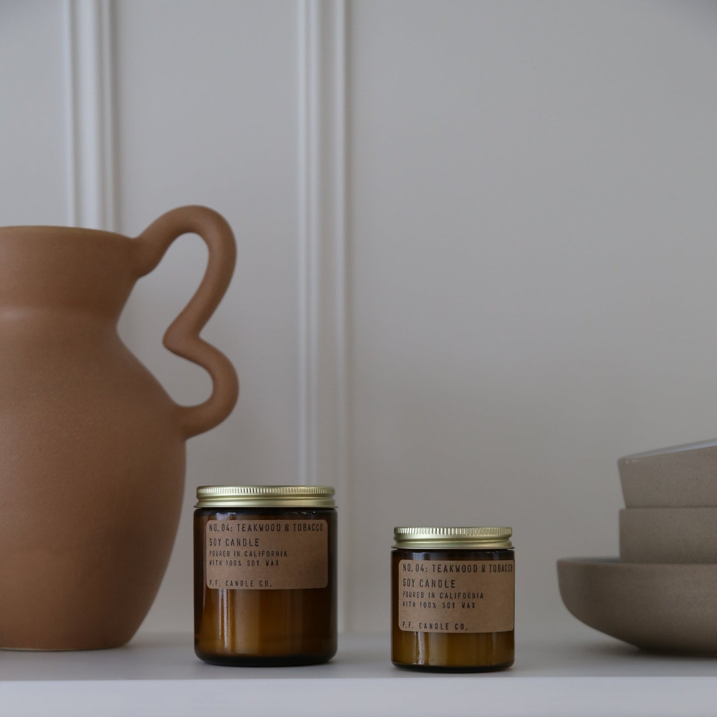 P.F. Candle Co mini teakwood and tobacco candle available at Rook & Rose.