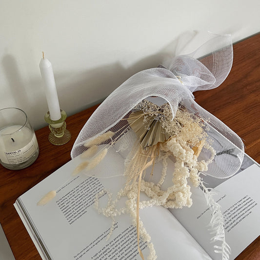 Photo is an example of a small neutral dried bouquet.