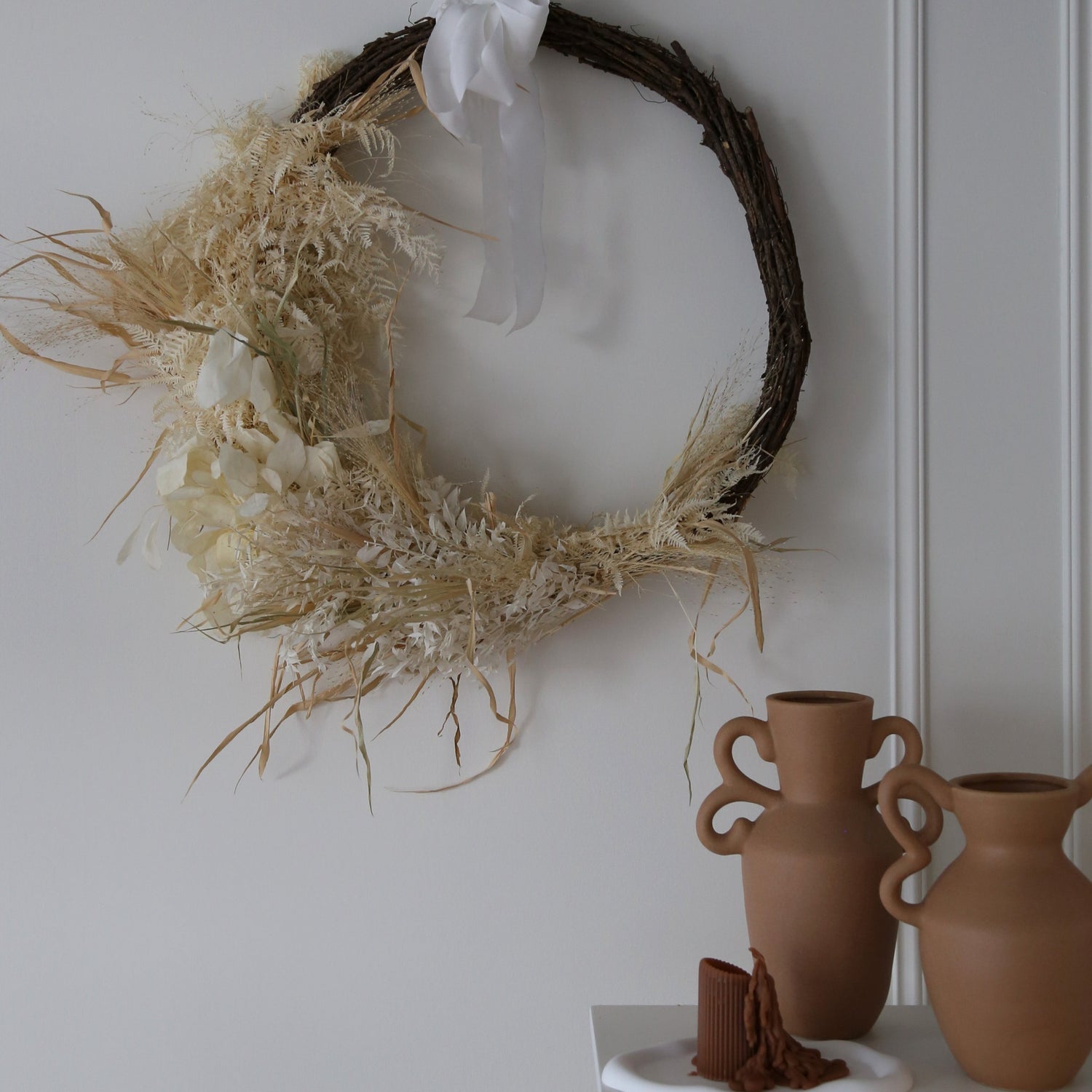 Photo is an example of a large crescent rustic wreath.