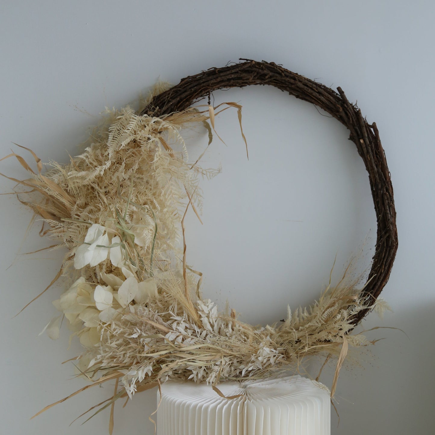 Photo is an example of a large crescent rustic wreath.