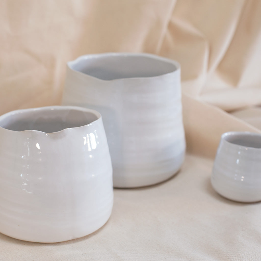 White 3" ceramic vase available at Rook & Rose